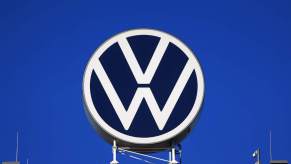 A Volkswagen logo against a blue background.