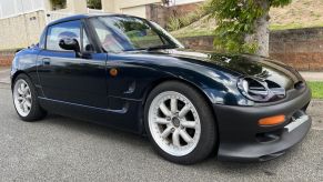 A 1994 Suzuki Cappuccino parked outdoors