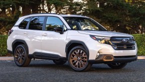 White 2025 Subaru Forester in the woods