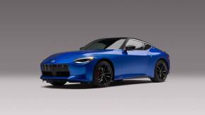 A Nissan Z Sport, one of the cheapest cars with 400 horsepower, shows off its blue paintwork.