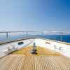 Looking out to see with coast in mid background from a yacht deck