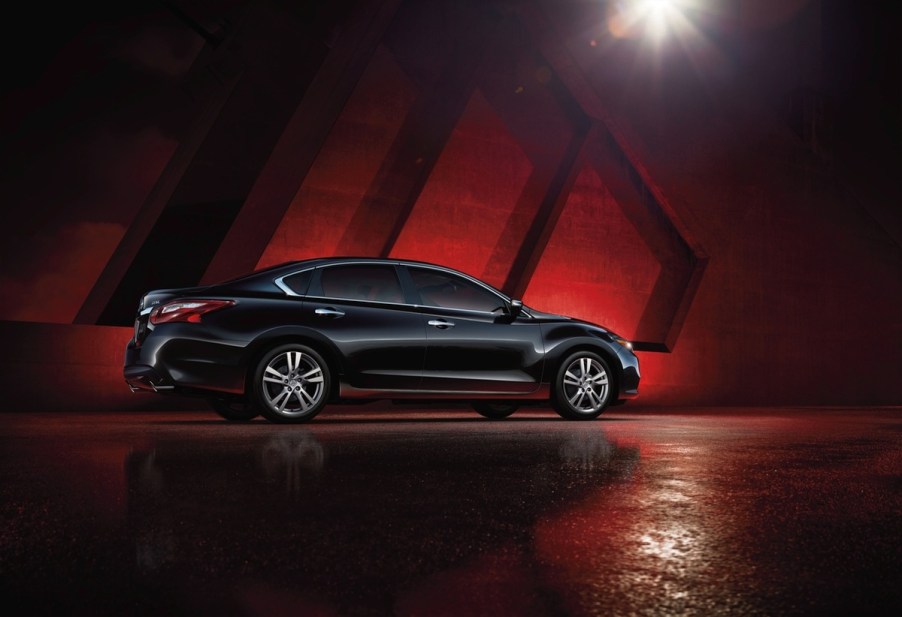 A 2016 Nissan Altima parked in a dark zone in far right side angle view