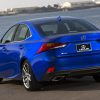 A dep blue colored 2018 Lexus IS 350 parked in left rear angle view