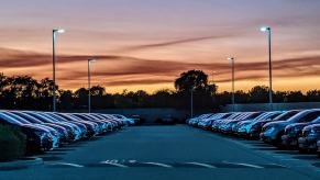 A car lot full of vehicles like the ones impacted by steep car tariffs.