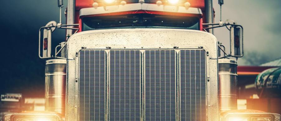 The chrome grille of a semi truck, closeup.
