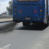 Black exhaust fumes pouring from the tailpipe of a bus in New Hampshire