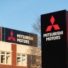 Mitsubishi motors logo on a black sign outside the automaker's headquarters during an Outlander SUV recall.