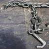 Chain hook on an empty rollback truck after a man climbed on to re-repossess his Ford SUV